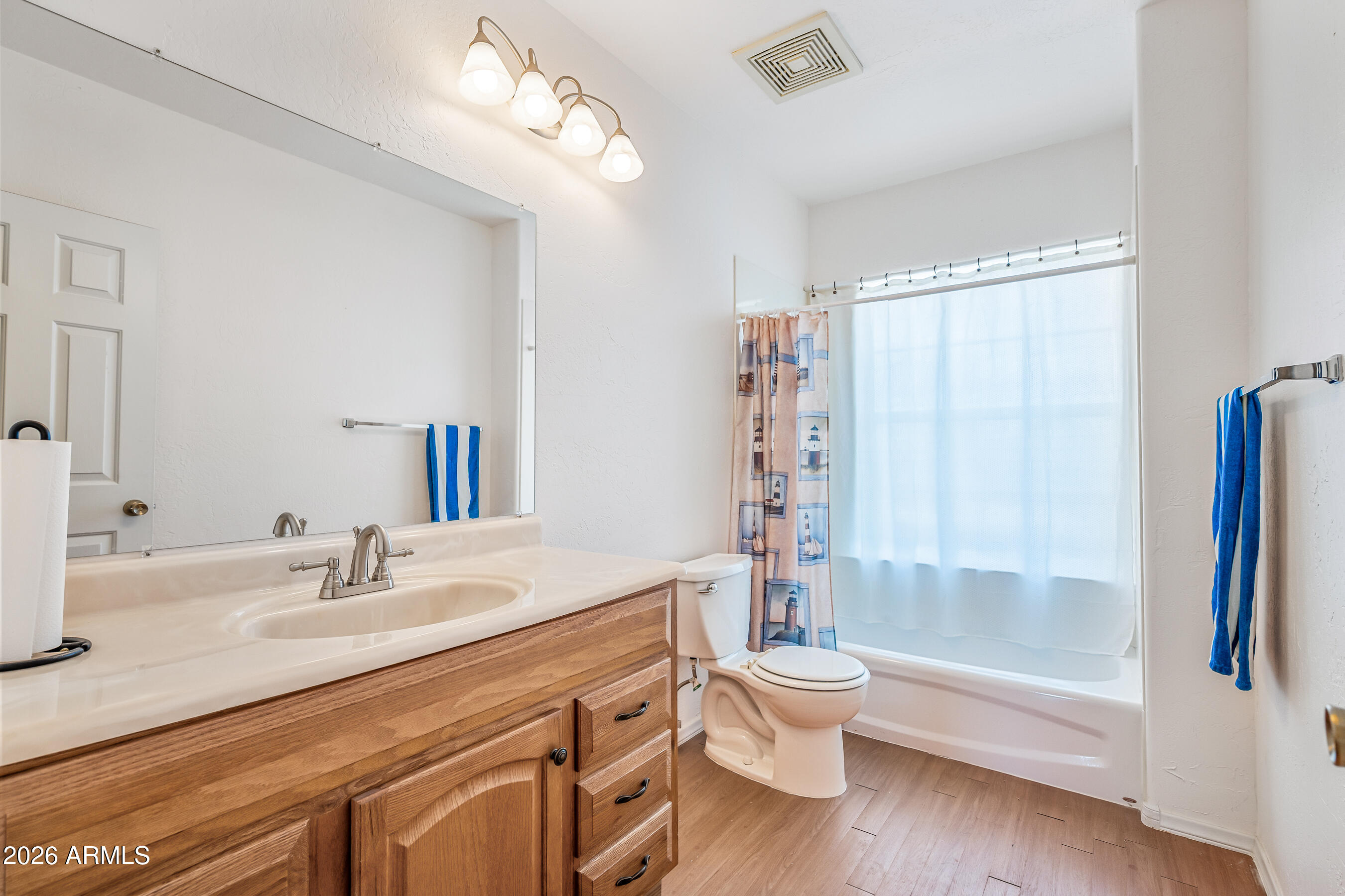 322 East Redfield Road Chandler, AZ 85225 - Photo 36 of 50 a bathroom with a bathtub shower sink vanity and toilet