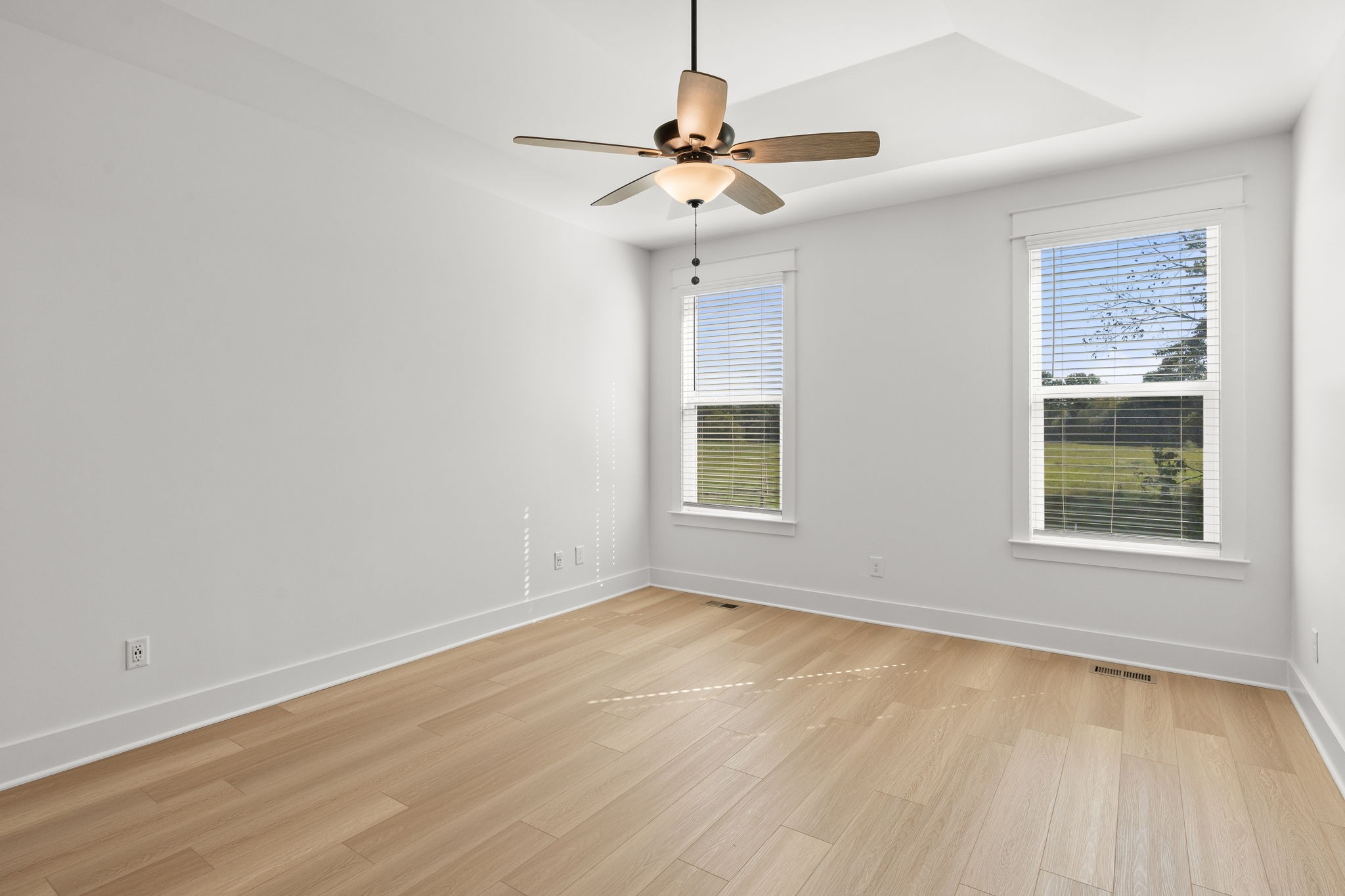 1257 Cotillion Drive Murfreesboro, TN 37128 - Photo 13 of 34 wooden floor in an empty room with a window