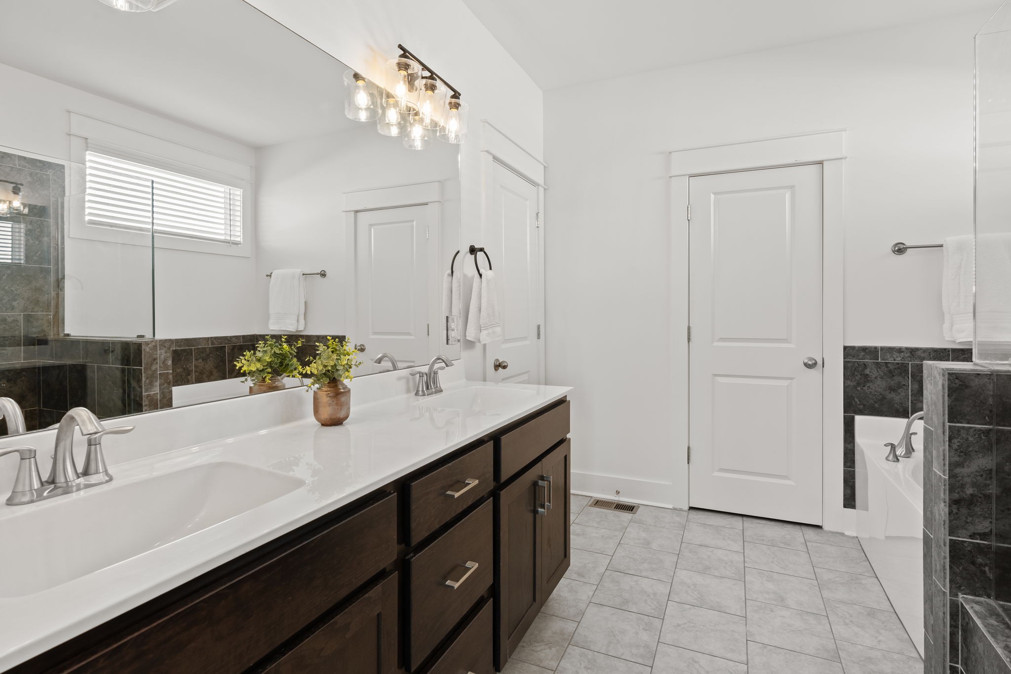 1257 Cotillion Drive Murfreesboro, TN 37128 - Photo 15 of 34 a bathroom with a sink and a mirror
