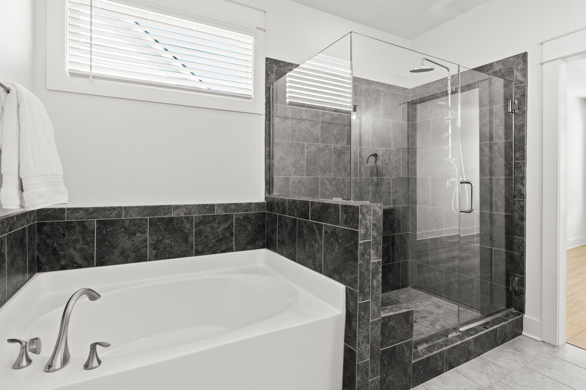 1257 Cotillion Drive Murfreesboro, TN 37128 - Photo 17 of 34 a bathroom with a bathtub and a shower