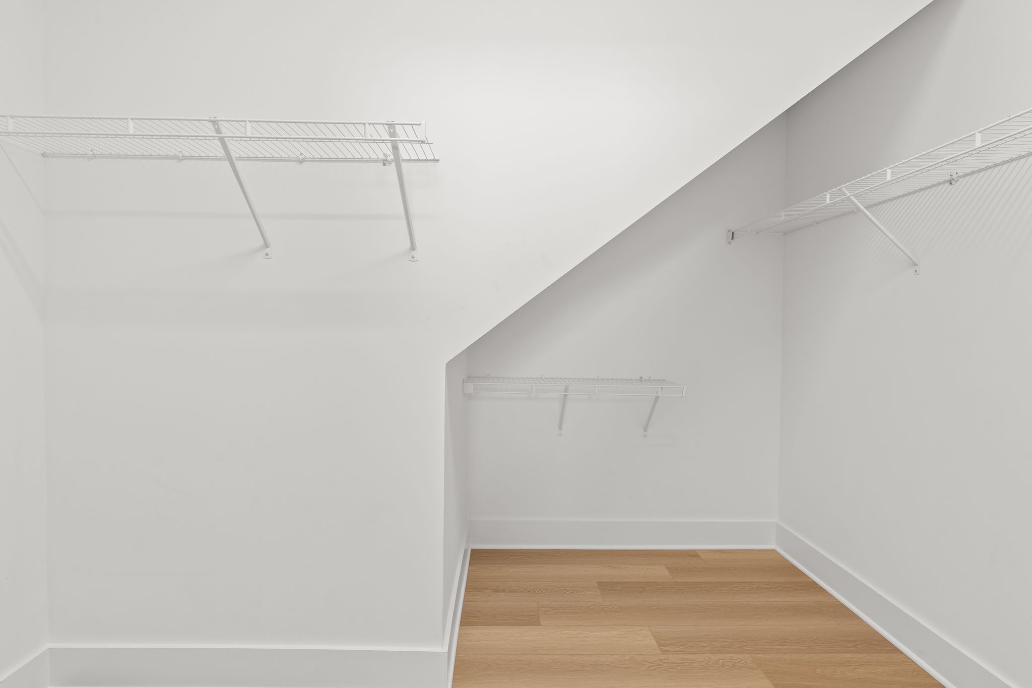 1257 Cotillion Drive Murfreesboro, TN 37128 - Photo 19 of 34 a view of a room with racks on the wall