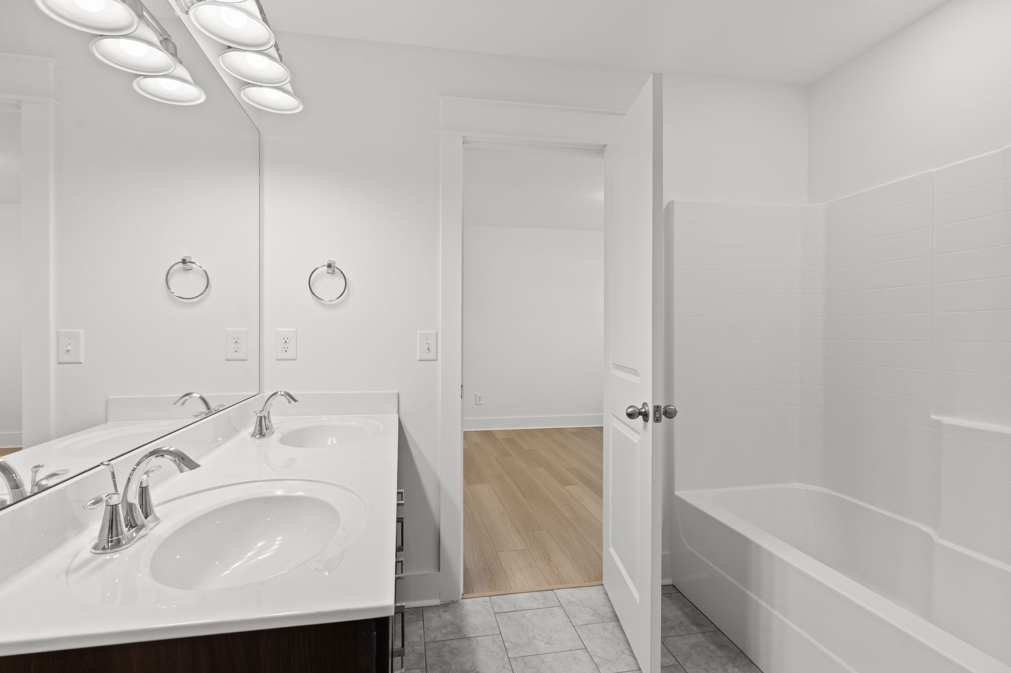 1257 Cotillion Drive Murfreesboro, TN 37128 - Photo 22 of 34 a bathroom with a sink and a bathtub