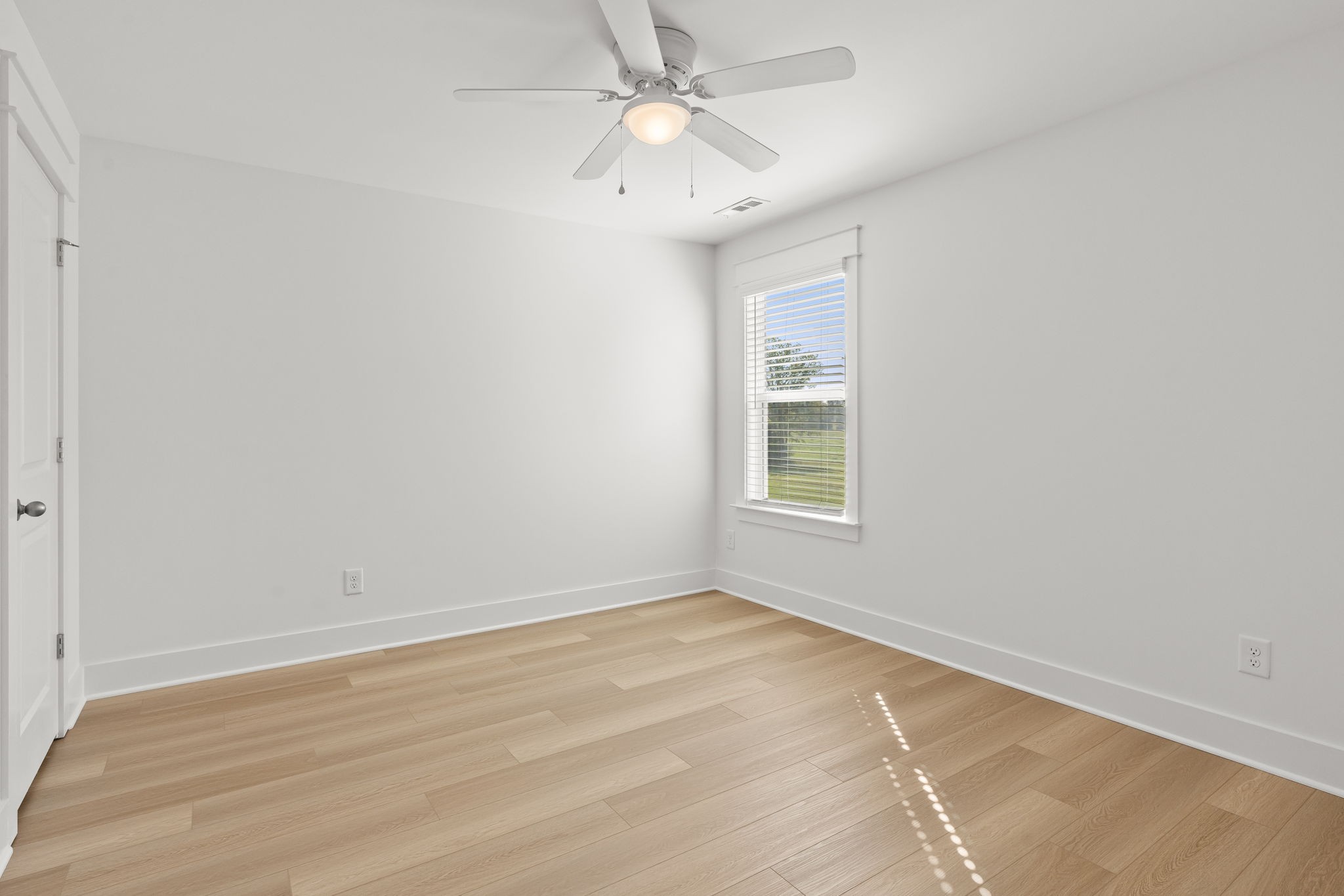 1257 Cotillion Drive Murfreesboro, TN 37128 - Photo 24 of 34 an empty room with a window and a fan