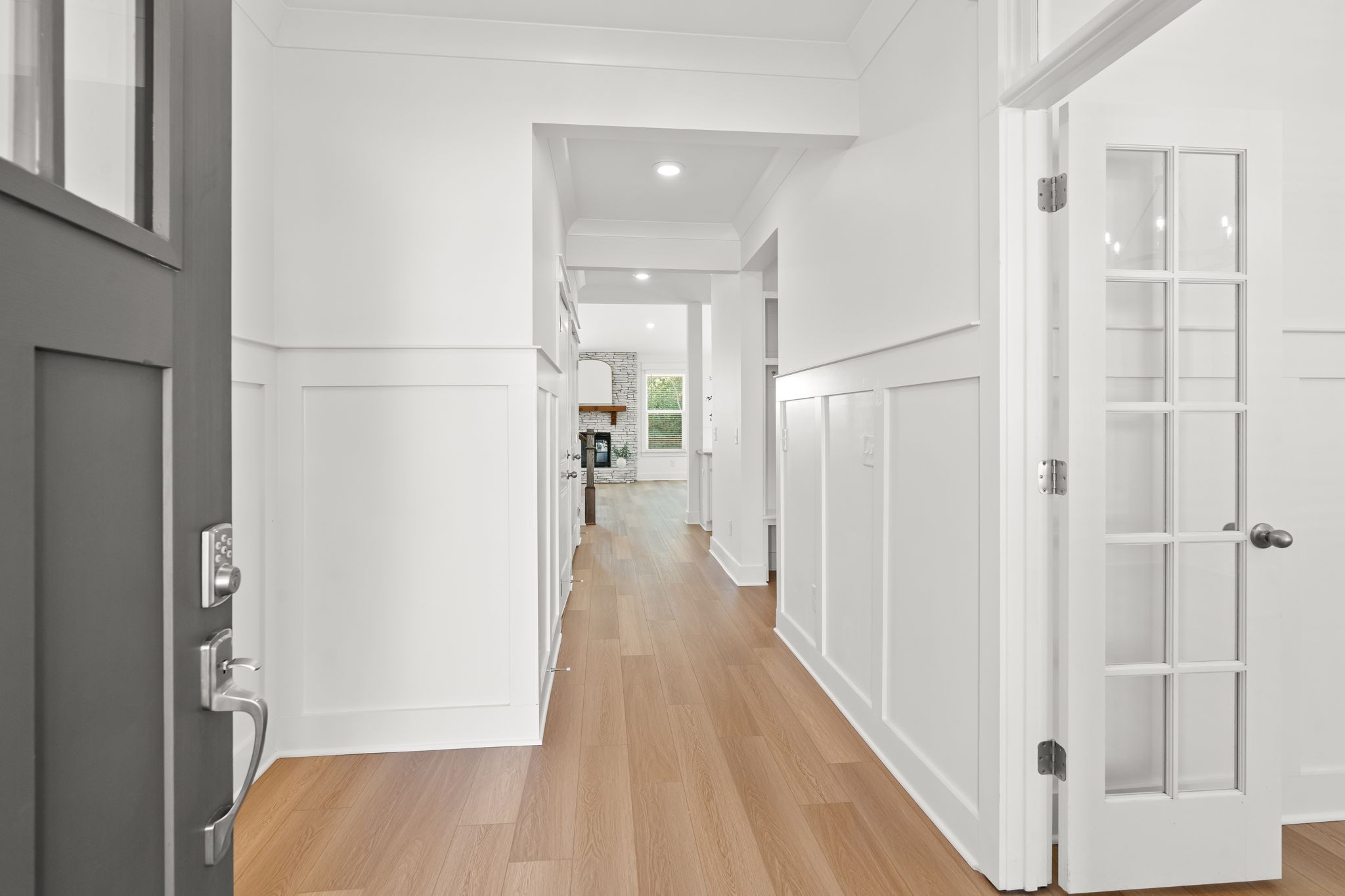 1257 Cotillion Drive Murfreesboro, TN 37128 - Photo 3 of 34 a view of hallway with wooden floor and staircase