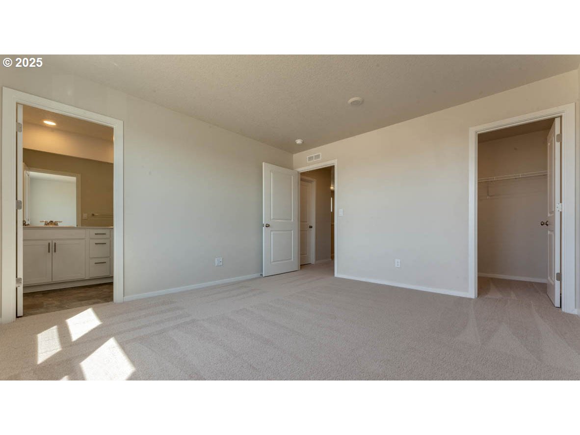 2960 U Street Springfield, OR 97477 - Photo 12 of 24 a open hall with a toilet