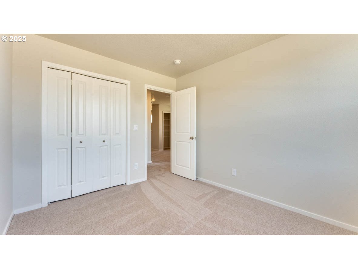 2960 U Street Springfield, OR 97477 - Photo 21 of 24 a open living room with a hallway