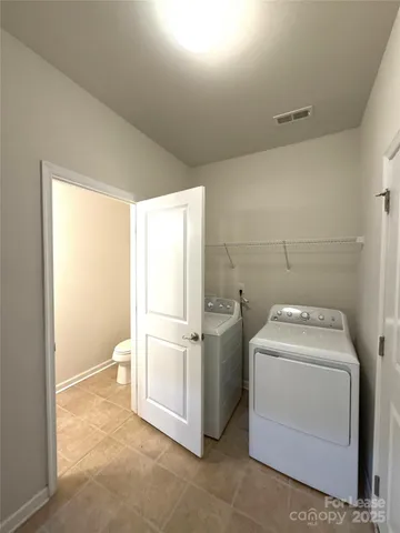 a bathroom with a sink and vanity