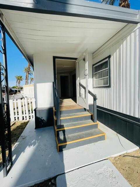 80870 Highway 111 Indio, CA 92201 - Photo 5 of 16 a view of staircase with a rug
