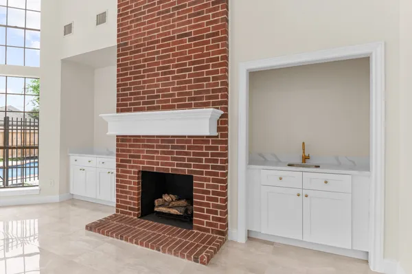 a view of staircase with white walls and windows