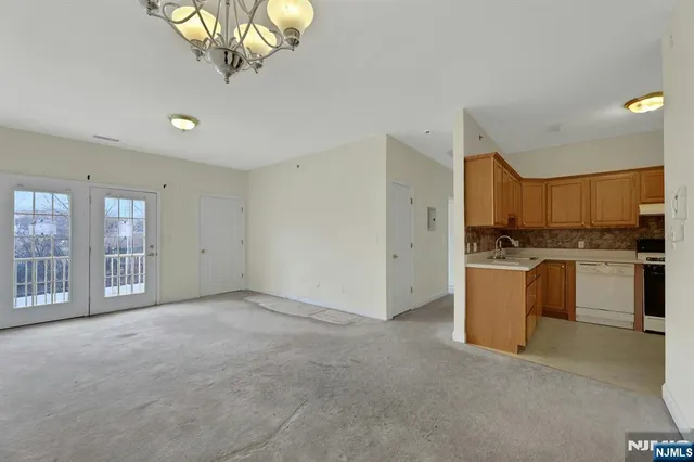a view of a kitchen with a sink cabinets and window