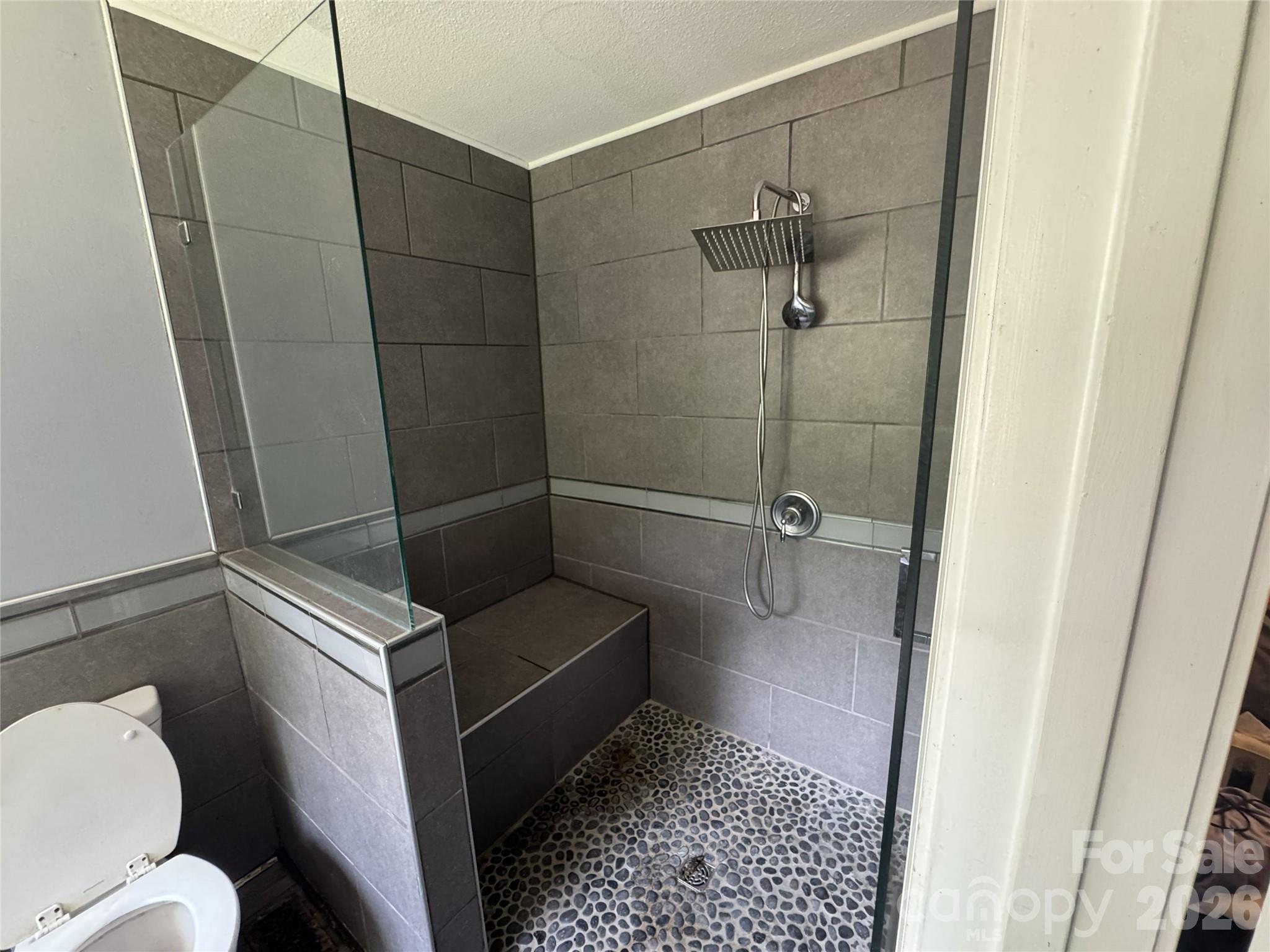 8441 Shelley Mullis Road Fort Mill, SC 29707 - Photo 9 of 23 a bathroom with a shower and a toilet