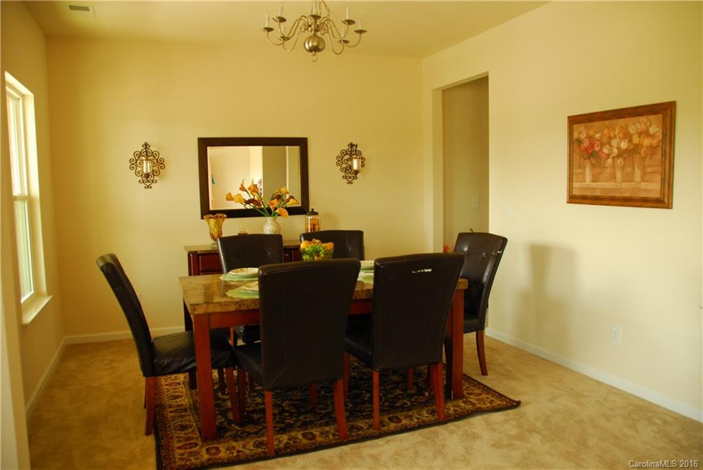 2181 Galloway Lane Southwest Concord, NC 28025 - Photo 5 of 11 a view of a dining room with furniture and window