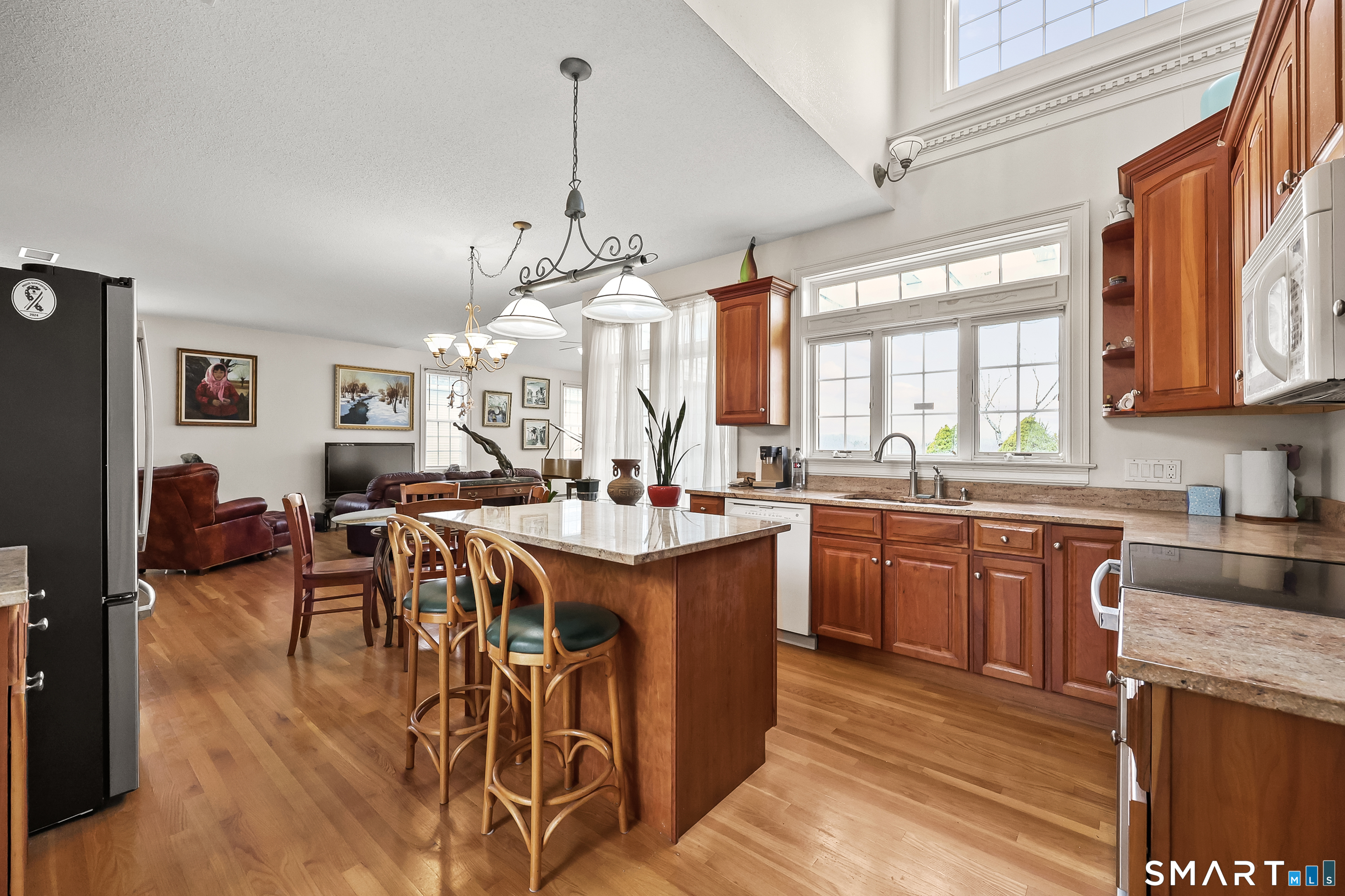 87 Wanda Lane Middletown, CT 06457 - Photo 12 of 39 a open kitchen with stainless steel appliances granite countertop a stove and refrigerator