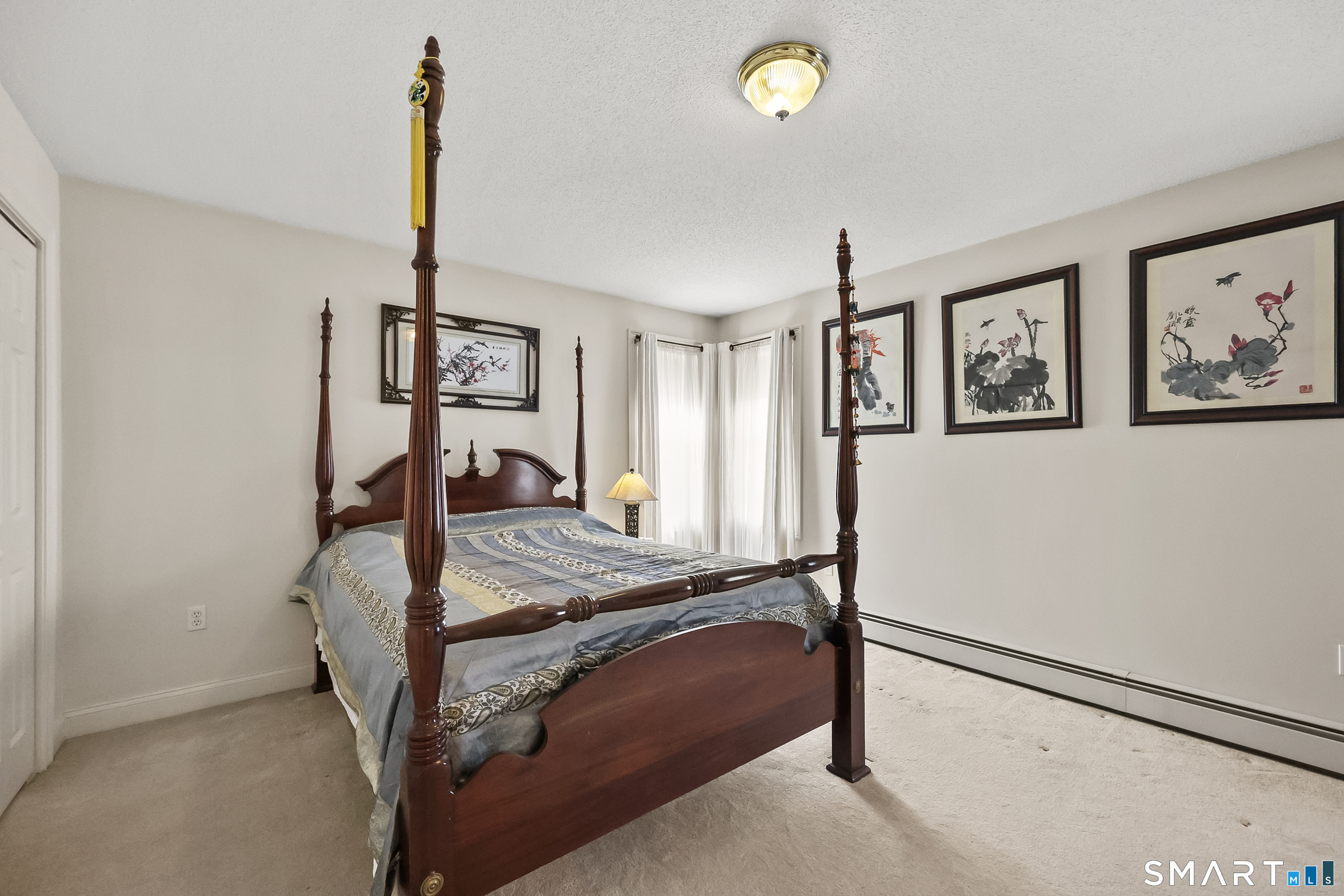 87 Wanda Lane Middletown, CT 06457 - Photo 22 of 39 a bed room with a bed