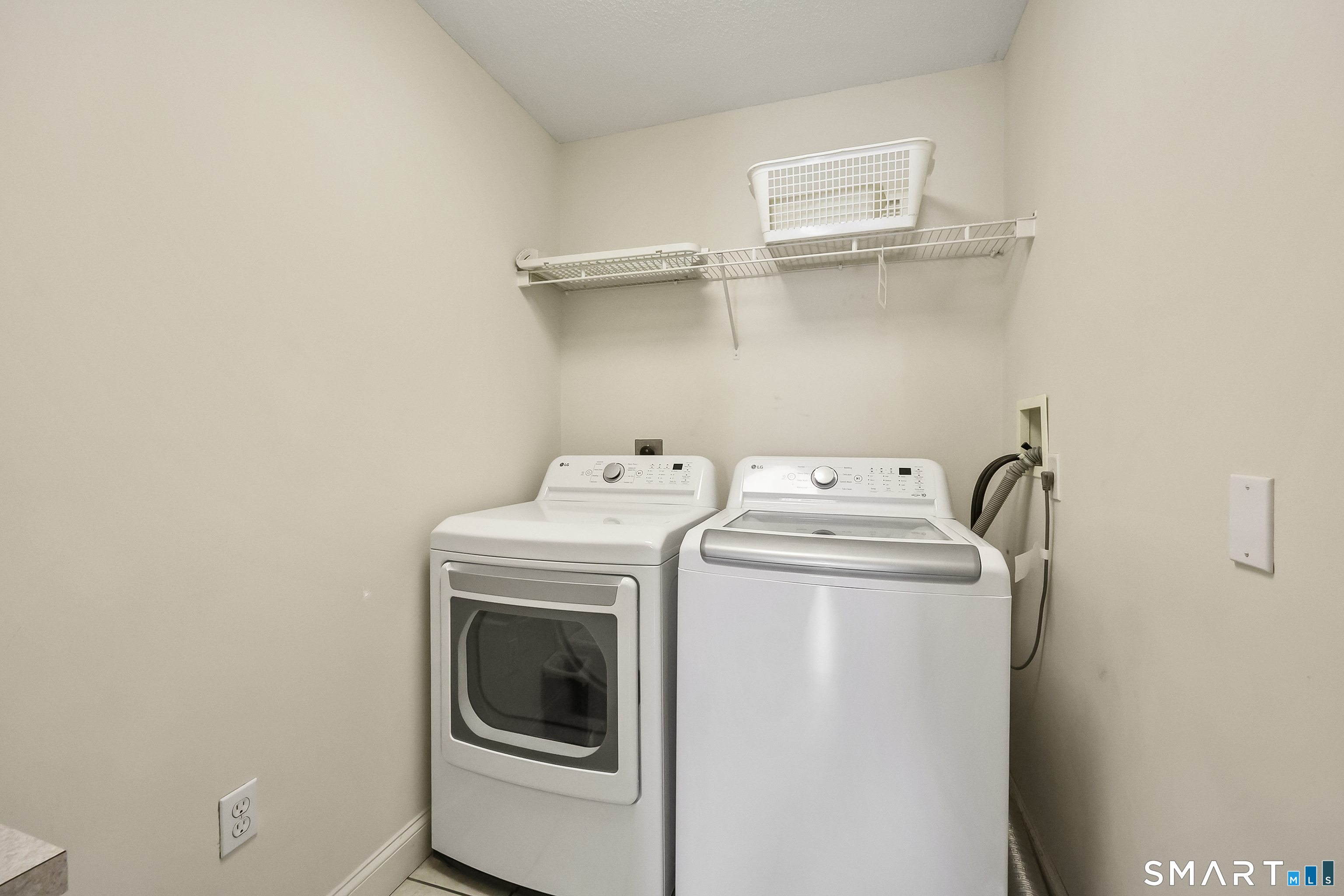 87 Wanda Lane Middletown, CT 06457 - Photo 25 of 39 a utility room with dryer and washer