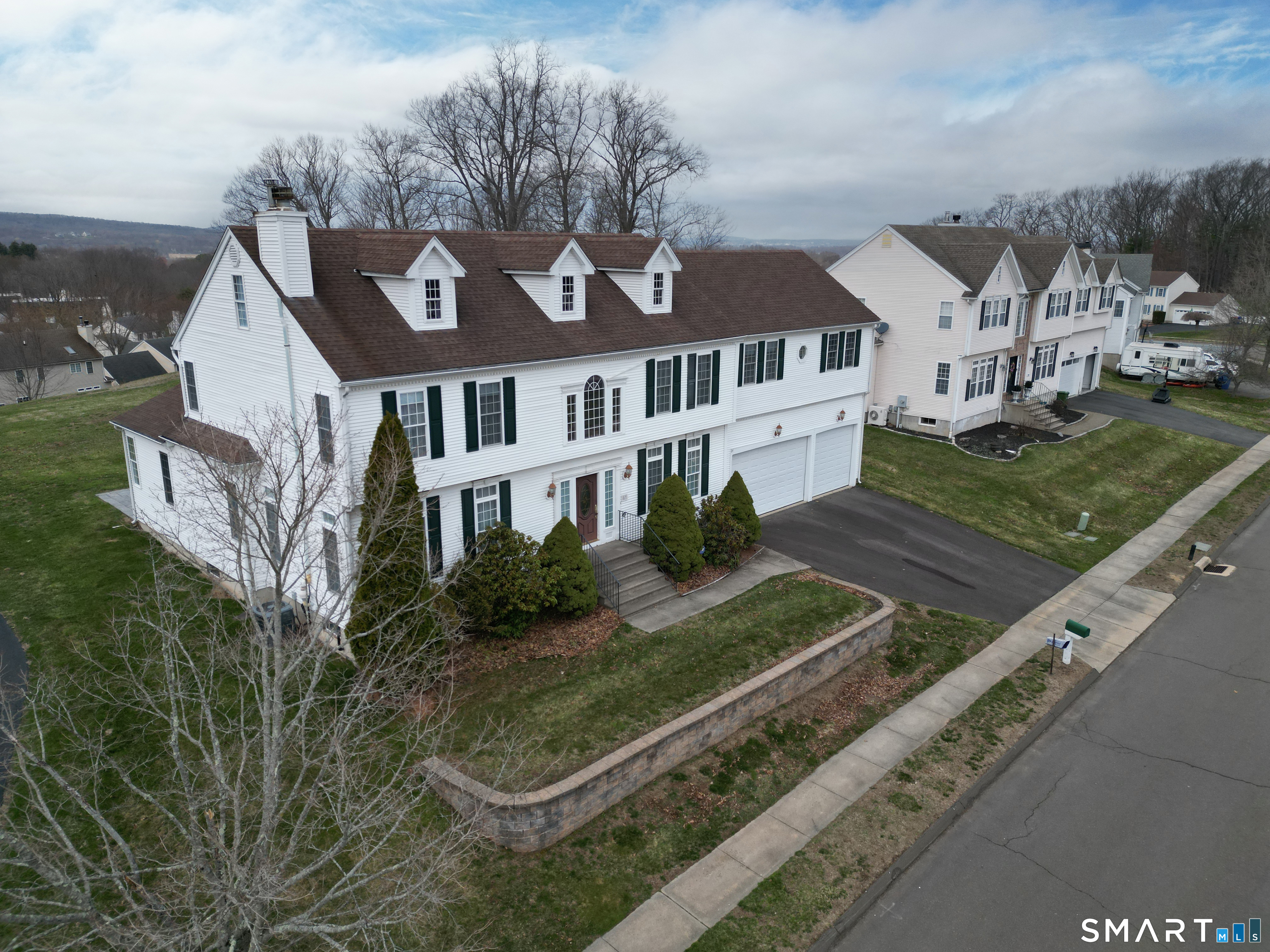 87 Wanda Lane Middletown, CT 06457 - Photo 3 of 39 a front view of a house with garden