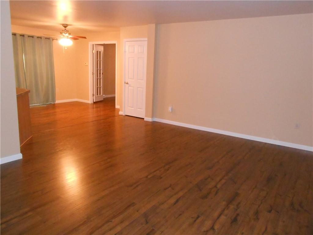 7224 Country Club Road Butler, PA 16001 - Photo 13 of 43 a view of hallway with wooden floor