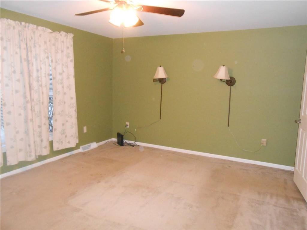 7224 Country Club Road Butler, PA 16001 - Photo 15 of 43 a view of an empty room with a window