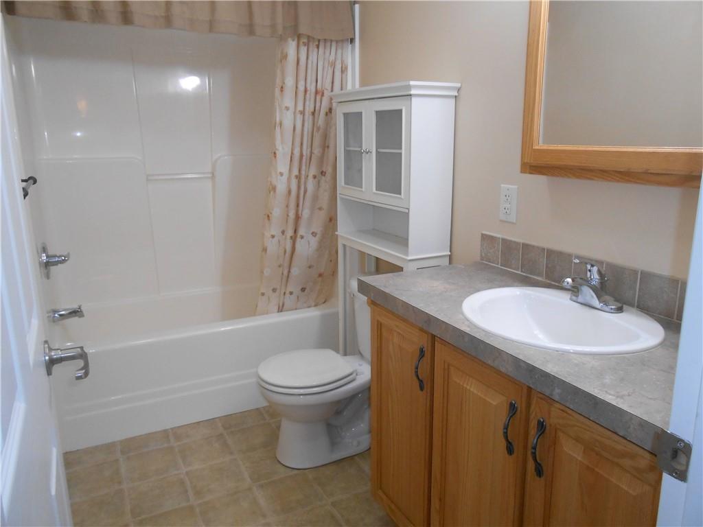 7224 Country Club Road Butler, PA 16001 - Photo 21 of 43 a bathroom with a sink toilet and shower