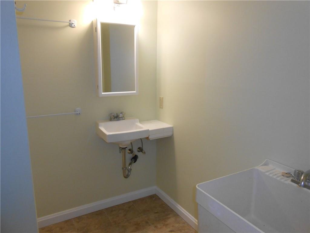 7224 Country Club Road Butler, PA 16001 - Photo 25 of 43 a bathroom with a sink and mirror