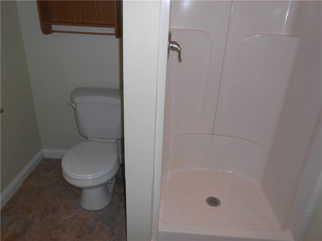 7224 Country Club Road Butler, PA 16001 - Photo 26 of 43 a bathroom with a toilet and a shower