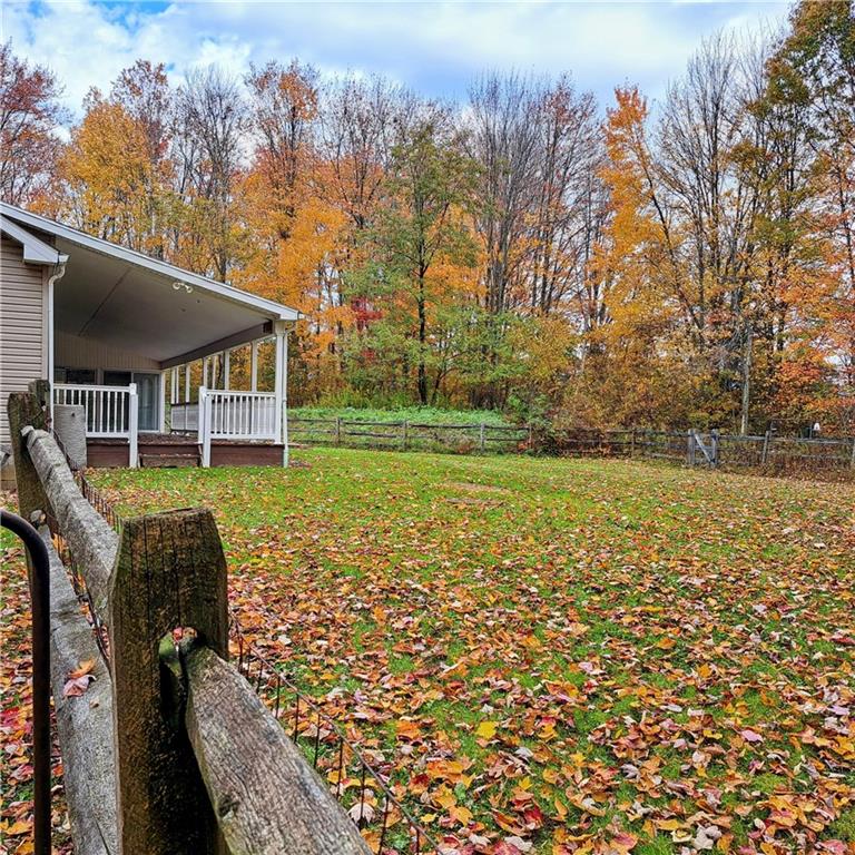 7224 Country Club Road Butler, PA 16001 - Photo 42 of 43 a view of a house with backyard porch and garden