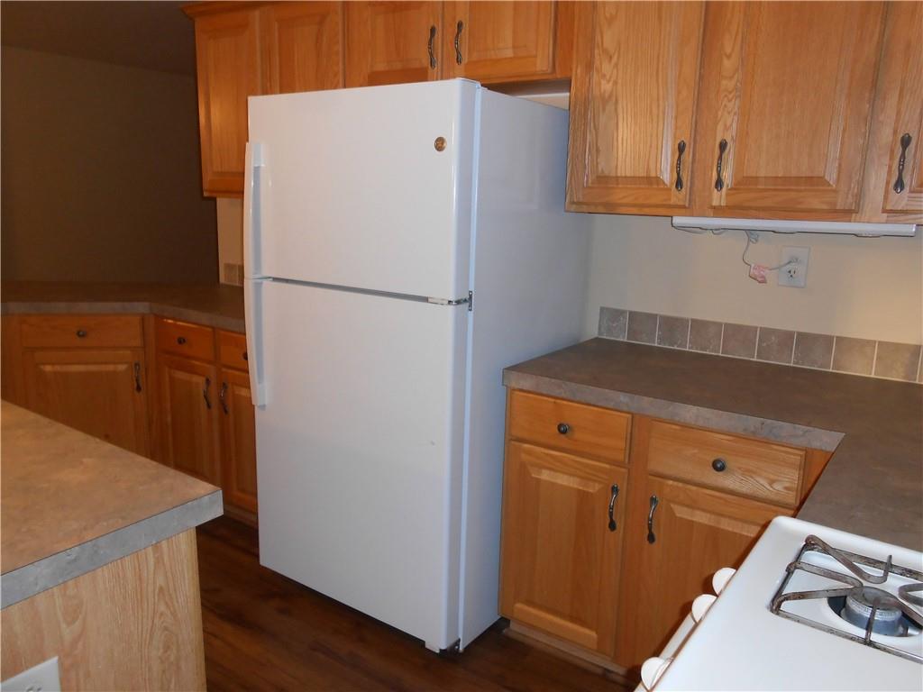 7224 Country Club Road Butler, PA 16001 - Photo 5 of 43 a view of a kitchen with refrigerator and cabinet