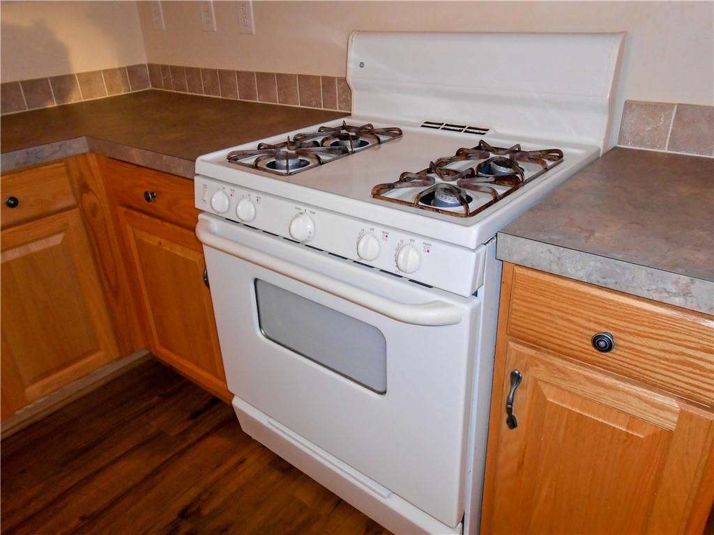 7224 Country Club Road Butler, PA 16001 - Photo 6 of 43 a stove top oven sitting inside of a kitchen