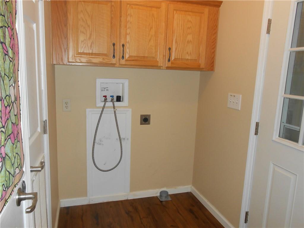 7224 Country Club Road Butler, PA 16001 - Photo 7 of 43 a bathroom with a glass shower door