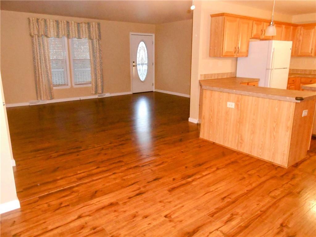 7224 Country Club Road Butler, PA 16001 - Photo 9 of 43 a view of a room with wooden floor and windows