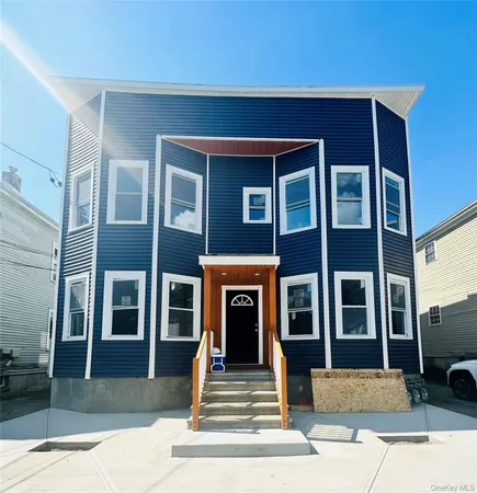 a front view of a building with windows
