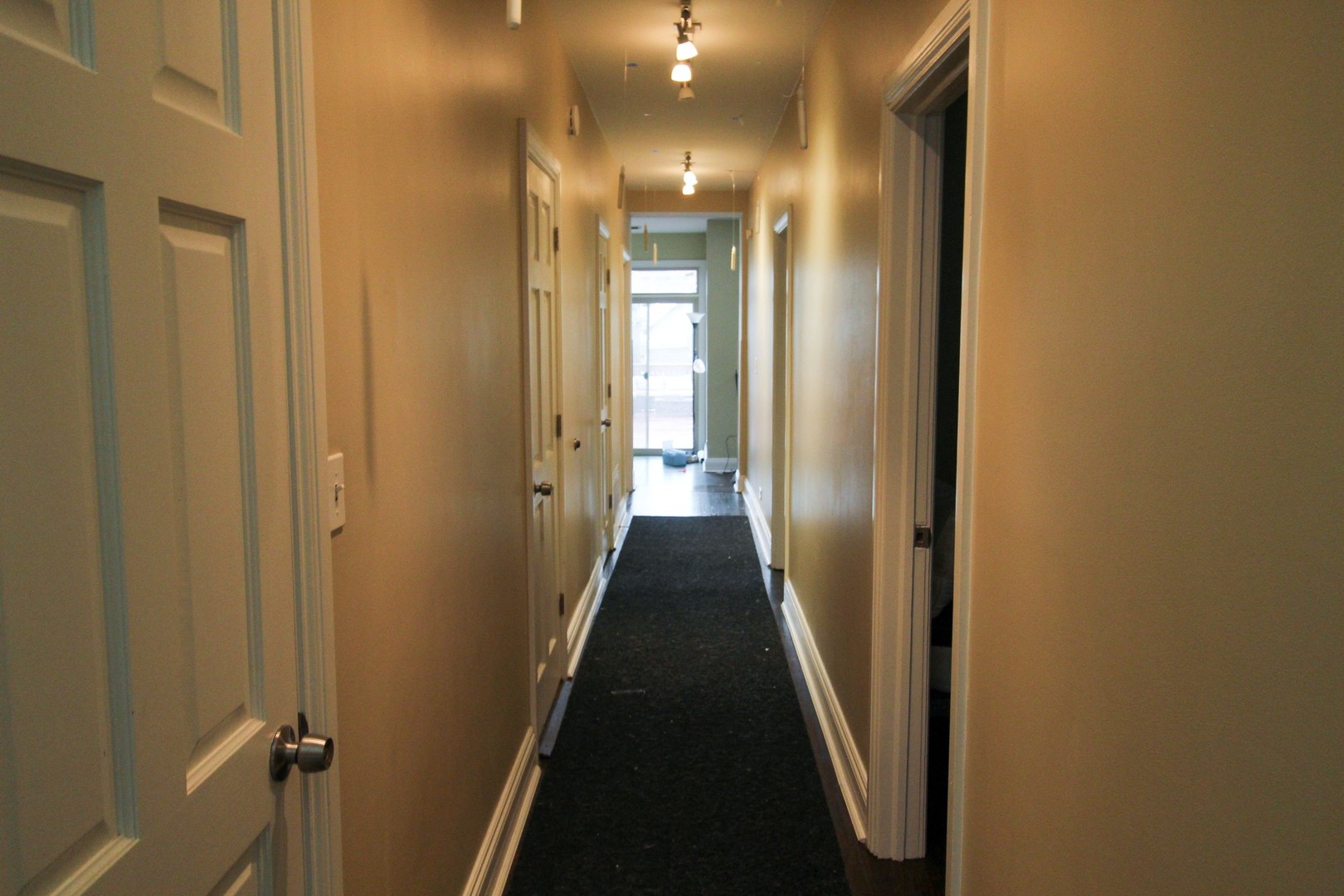 815 South Bell Avenue Chicago, IL 60612 - Photo 22 of 39 a view of a hallway with wooden floor
