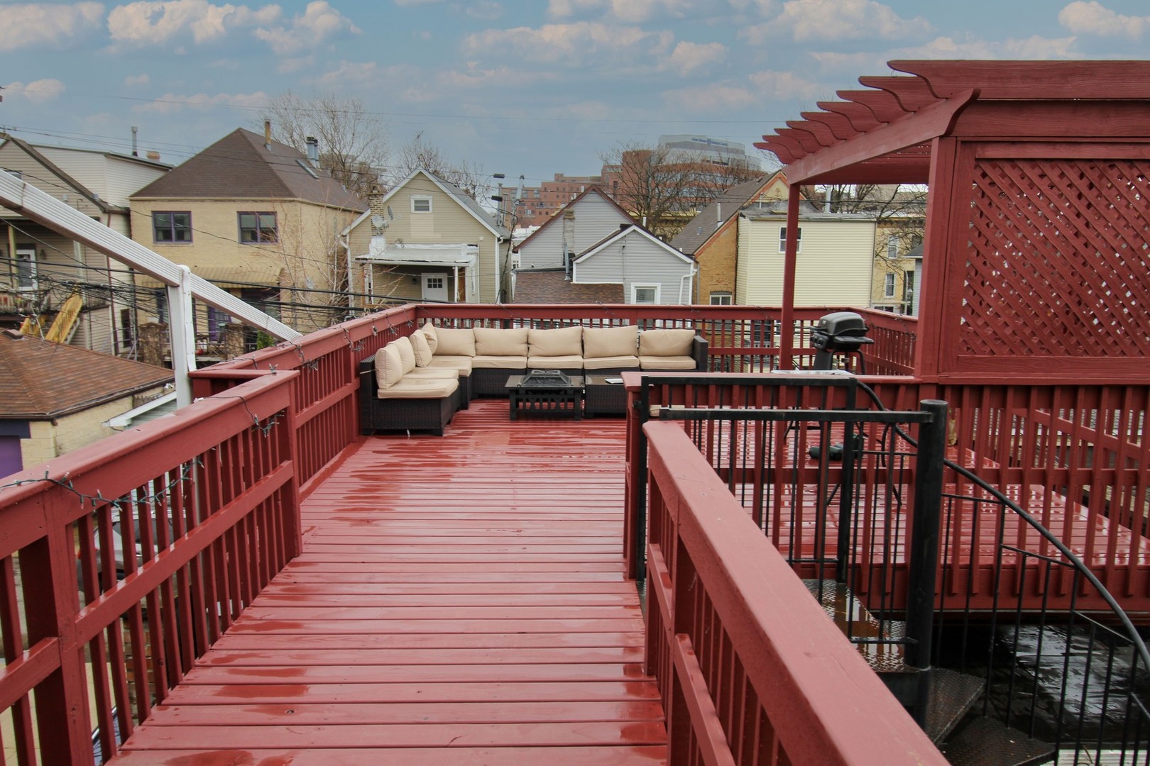 815 South Bell Avenue Chicago, IL 60612 - Photo 25 of 39 a view of balcony with wooden floor and fence