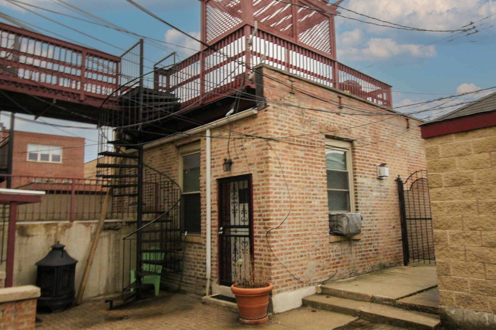 815 South Bell Avenue Chicago, IL 60612 - Photo 29 of 39 a front view of a house with patio