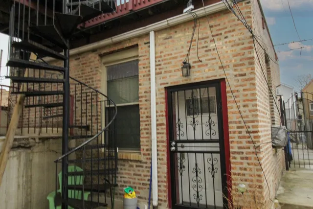 a front view of a house with a glass door