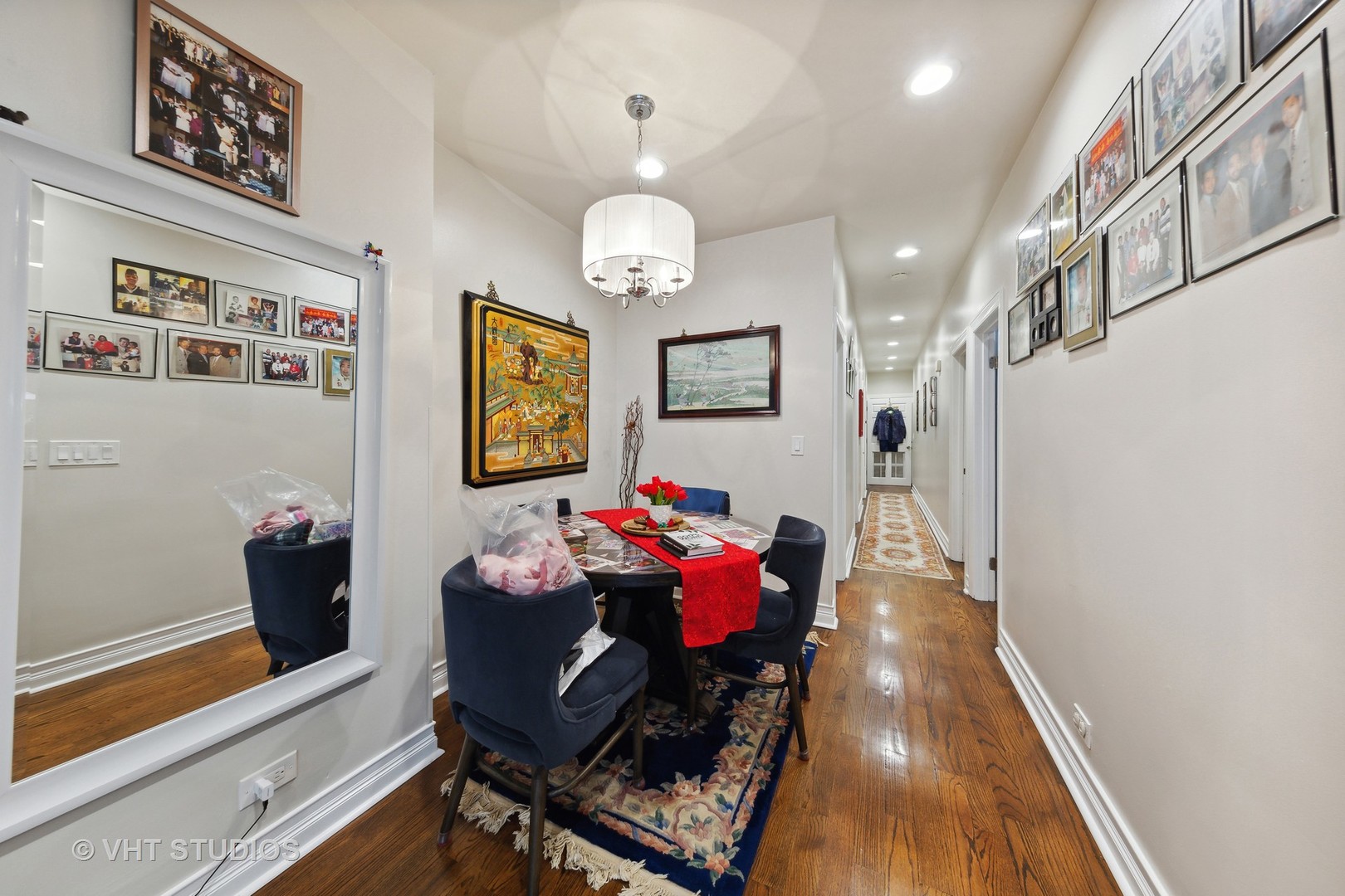 815 South Bell Avenue Chicago, IL 60612 - Photo 6 of 39 a living room with furniture and a chandelier