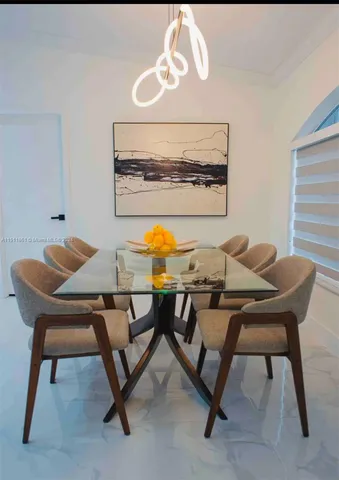 a view of a dining room with furniture