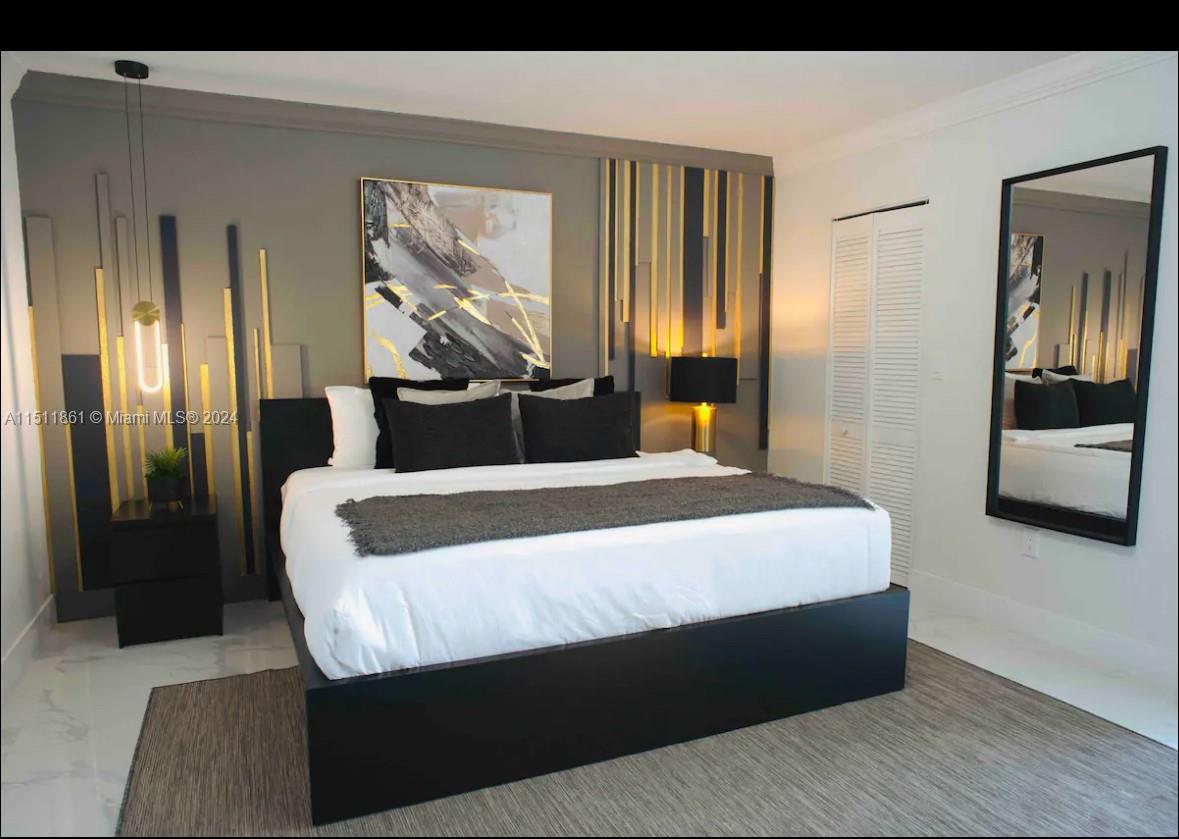 14236 Southwest 164th Terrace Miami, FL 33177 - Photo 20 of 29 a bedroom with a large bed and a dresser