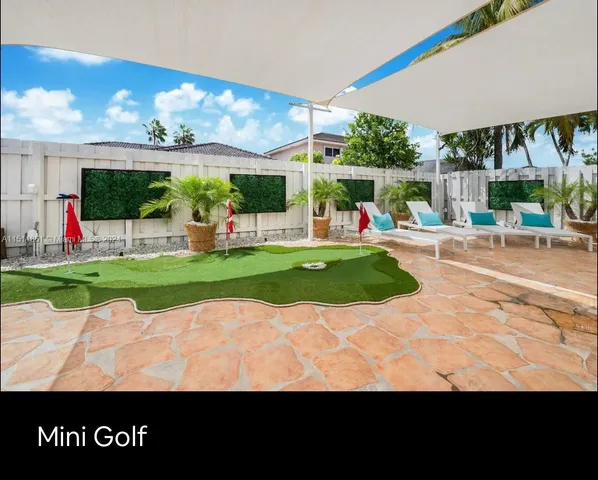 a view of dinning table and chairs in a room