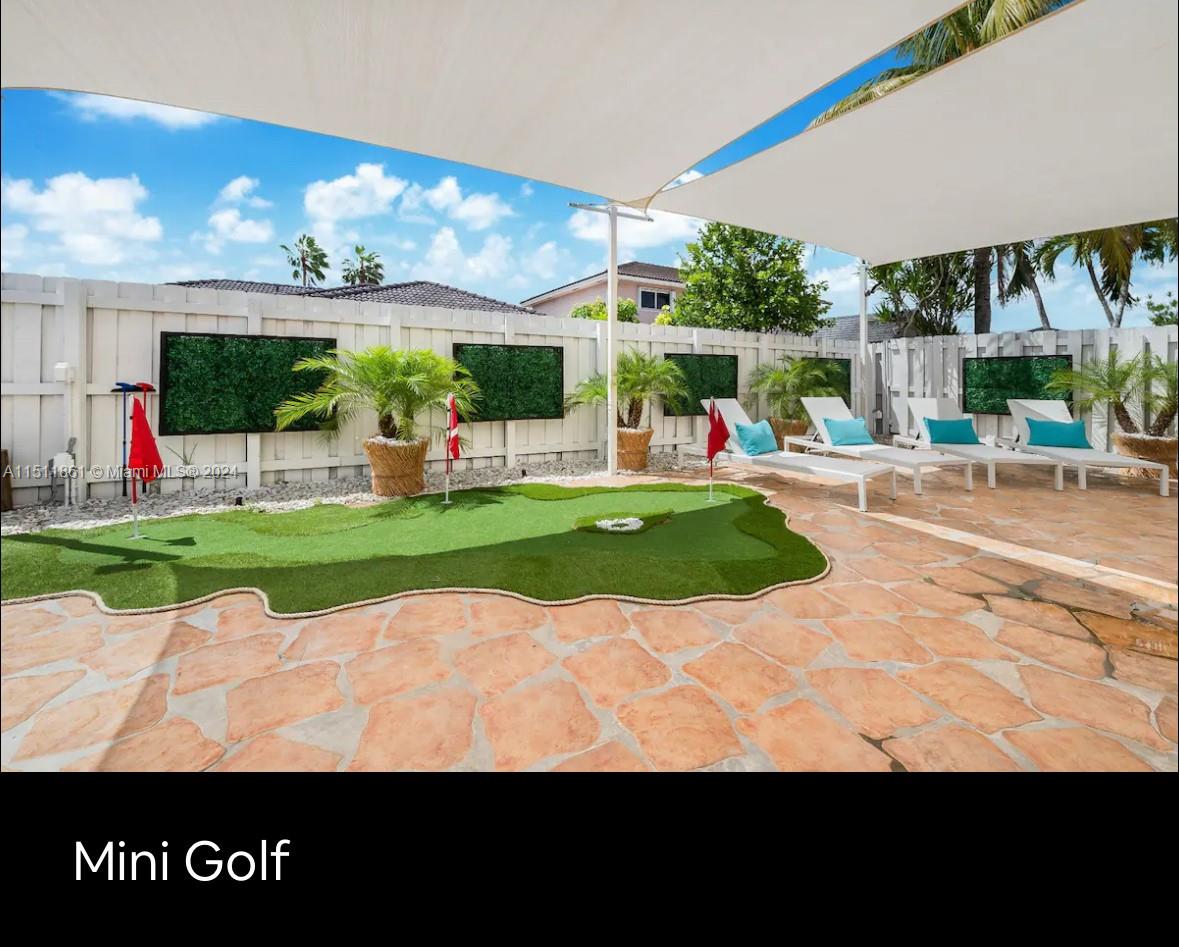 14236 Southwest 164th Terrace Miami, FL 33177 - Photo 27 of 29 a view of a volley ball court