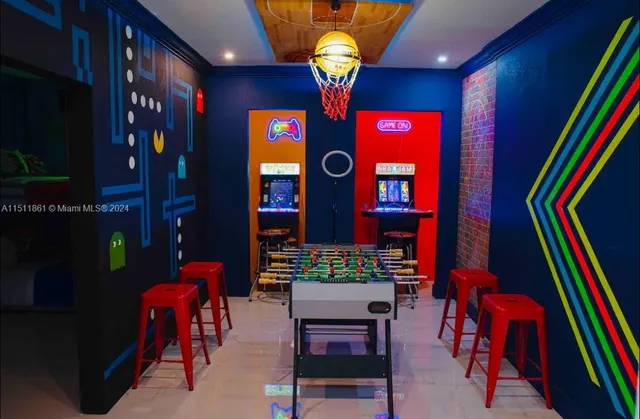 a white house with a yard and a large parking space