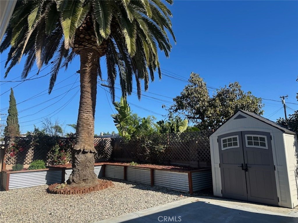 8772 Sumner Place Cypress, CA 90630 - Photo 8 of 8 a front view of a house with a yard