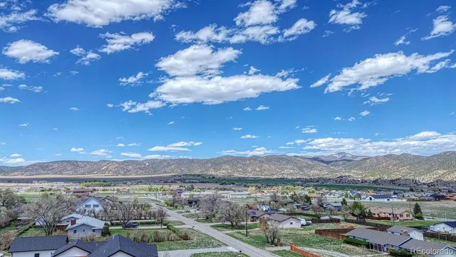 a view of a city with an ocean