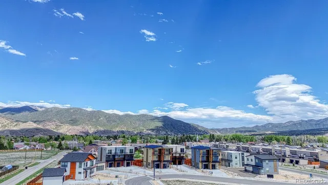 a view of an houses with a lake