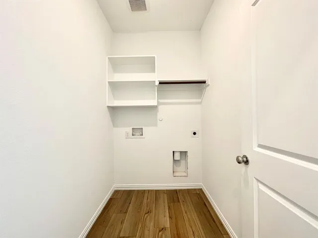 a view of a room with storage and racks