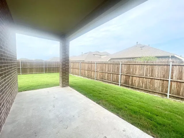 a view of a backyard with a garden