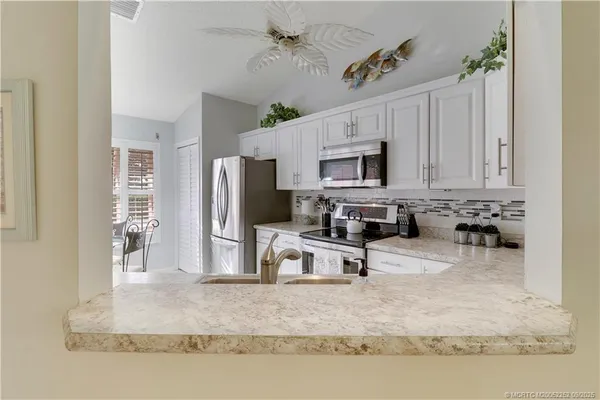$330,000 | 6021 Southeast Martinique Drive, Unit 201, Stuart, FL 34997