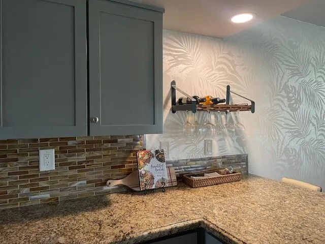 a kitchen with sink and window
