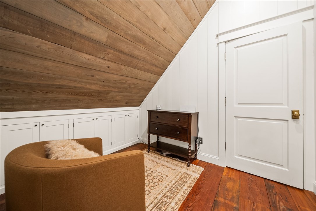 425 Barnhardt Road Timbo, AR 72680 - Photo 48 of 60 Slanted wood-panel ceiling with white beadboard walls
