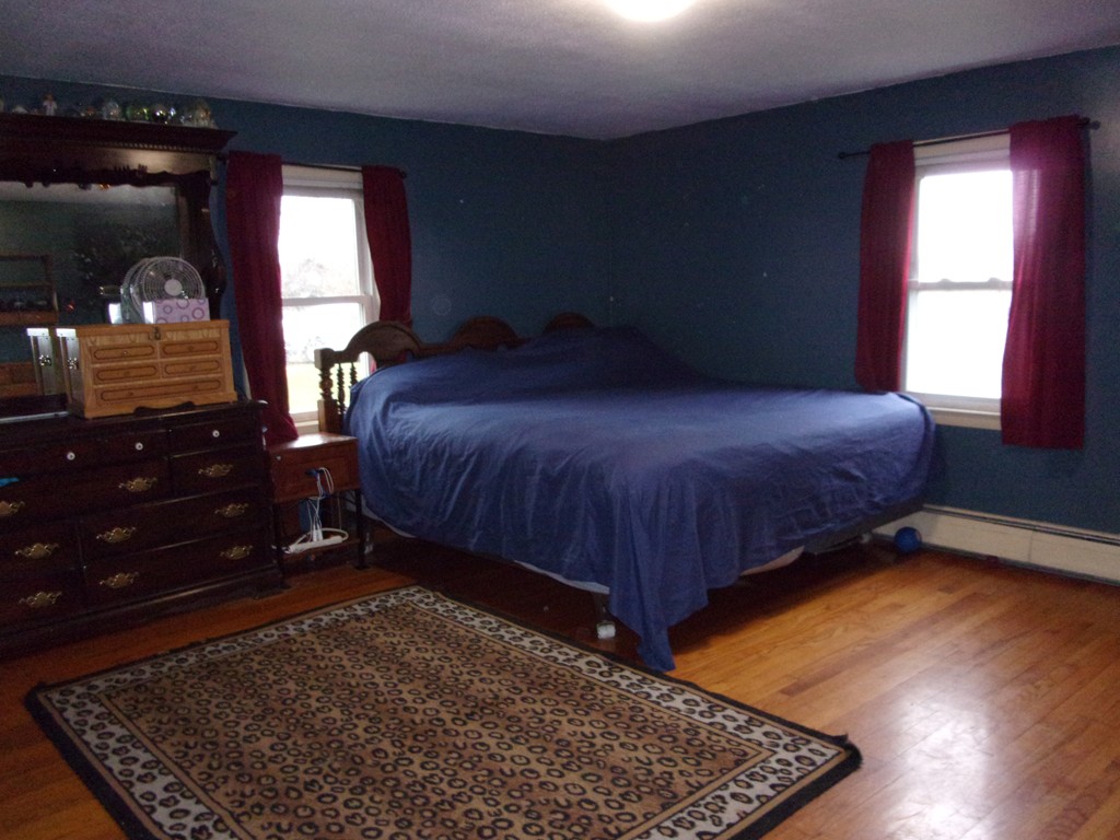 145 Main Road Westhampton, MA 01027 - Photo 23 of 30 a bedroom with a bed and window